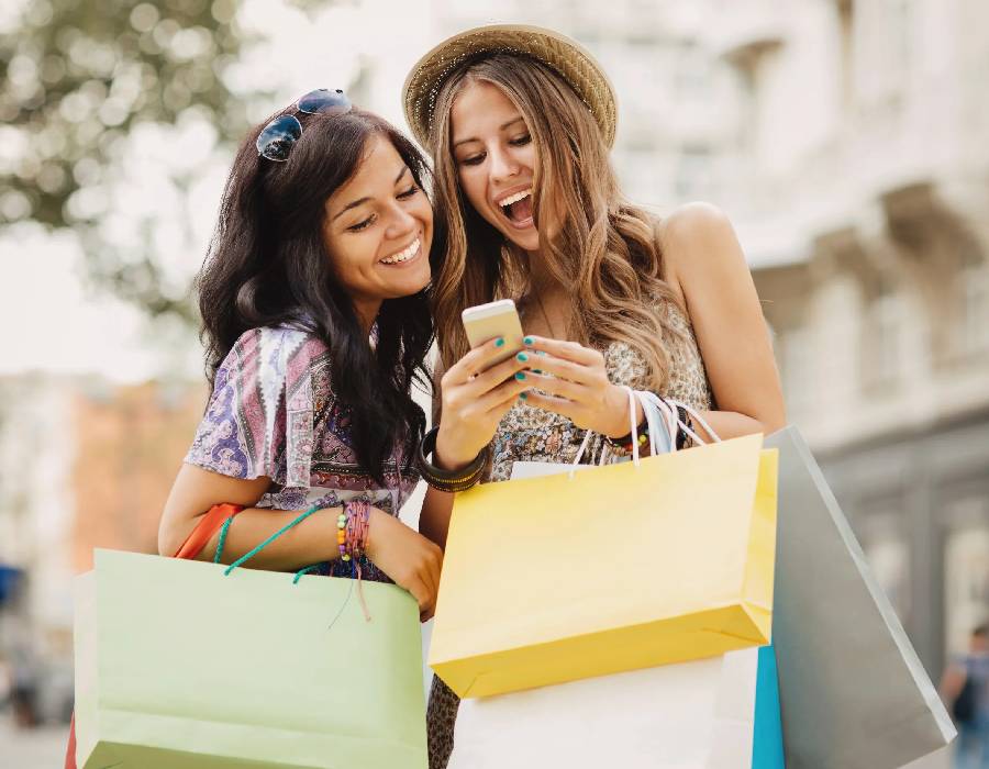 Online shopping on laptop with cart icon - Pexels